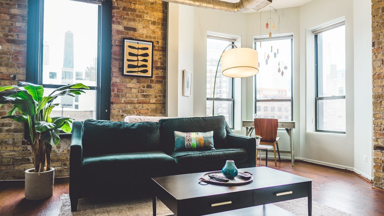 Contemporary living room with elegant decor and cozy furniture in urban setting.